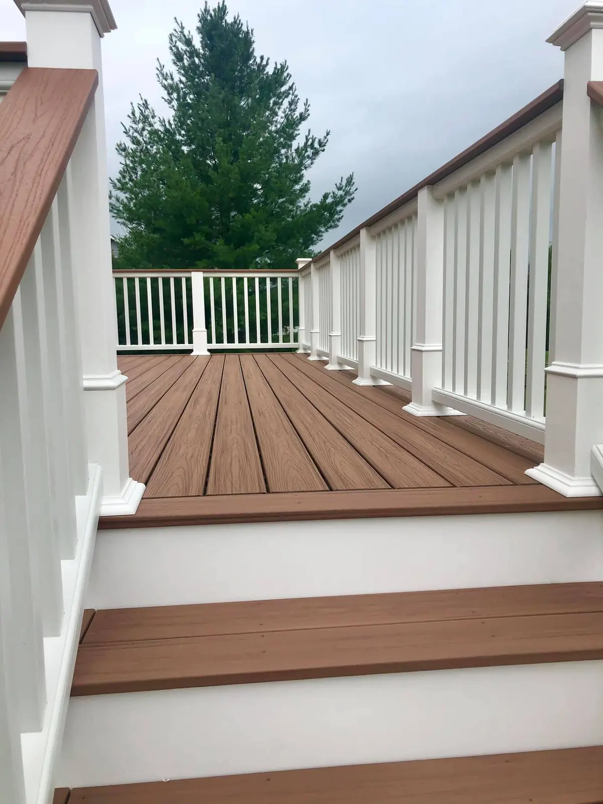Composite deck boards and railing system on a Hudson Valley home