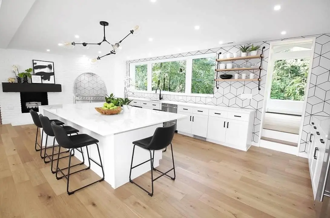 Light-filled kitchen remodel with white cabinetry in a Hudson Valley home